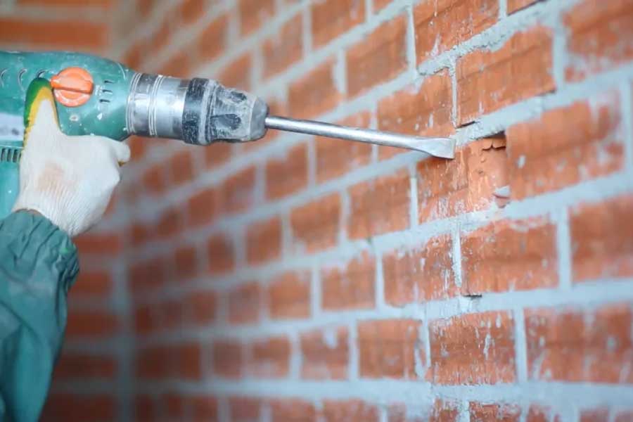 How to find a water leak in a brick wall